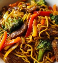 beef stir fry with noodles and sticky sauce