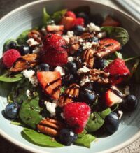 berry spinach salad with pecans feta and balsamic glaze