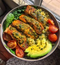 lemon herb salmon and avocado quinoa bowl
