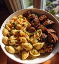 cajun steak bites and cheesy garlic shells skillet