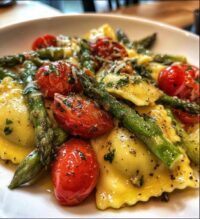ravioli with tomatoes asparagus garlic and herbs