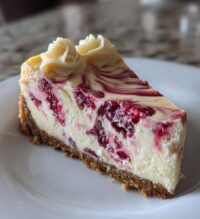 white chocolate raspberry swirl cheesecake