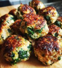 spinach garlic meatballs stuffed with mozzarella